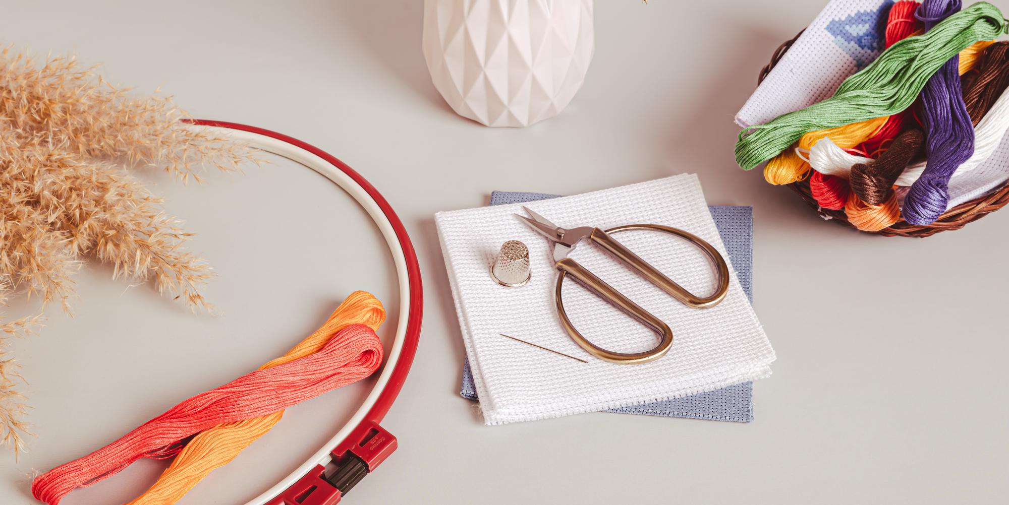 Workshop table with embroidery tools
