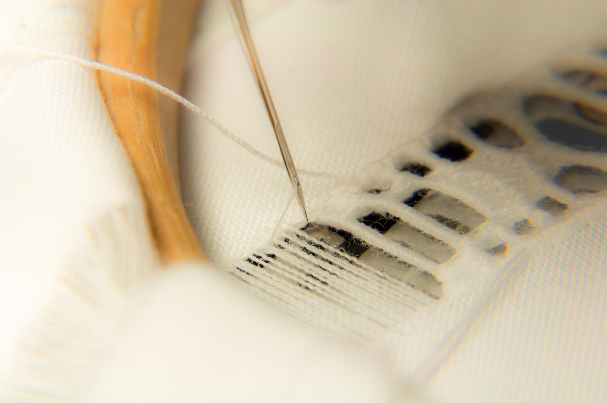 Close-up embroidered pattern on linen